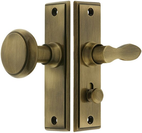 New York Screen Door Latch Set in Antique Brass.